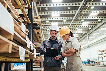 Employees in an automated warehouse