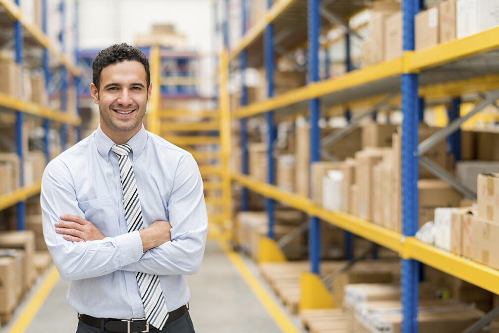 Business man in a warehouse